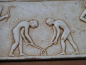 Preview: Young men playing hockey  relief replica, 10 x 21 cm, 0,3 kg